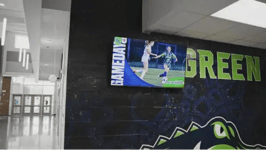 Green Level High School digital signage in hallway